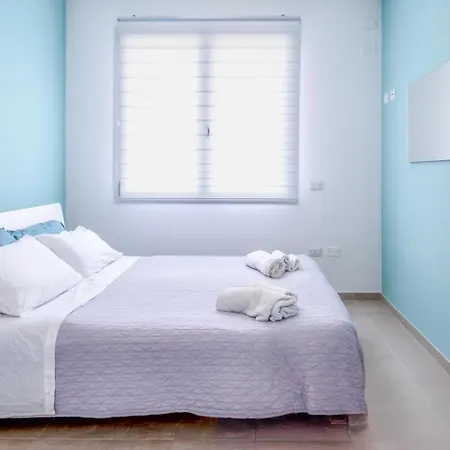 Апартаменты Tramonto Sul Mare Сан-Джованни-ди-Синис