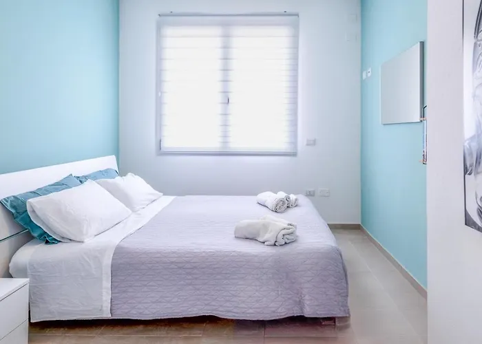 Апартаменты Tramonto Sul Mare Сан-Джованни-ди-Синис